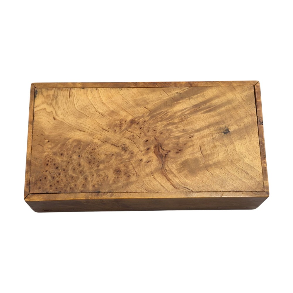A rectangular Karelian birch box featuring a prominent silver and enamel Imperial Russian regimental badge mounted centrally on the lid. View IX