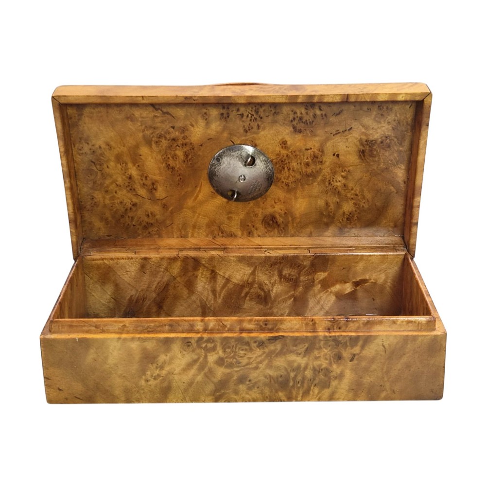 A rectangular Karelian birch box featuring a prominent silver and enamel Imperial Russian regimental badge mounted centrally on the lid. View X