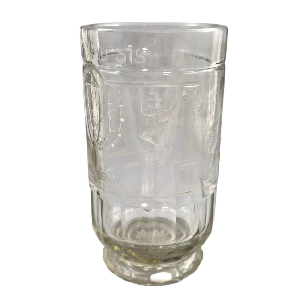 A large clear glass beaker featuring detailed wheel-engraved ceremonial iconography, vertical fluted panels near the lower rim, and a faceted base. View XV