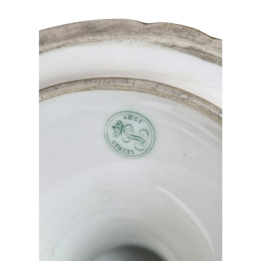 A cobalt blue and gilt porcelain tazza elevated on a pedestal base, adorned with a hand-painted winter landscape cartouche. View V