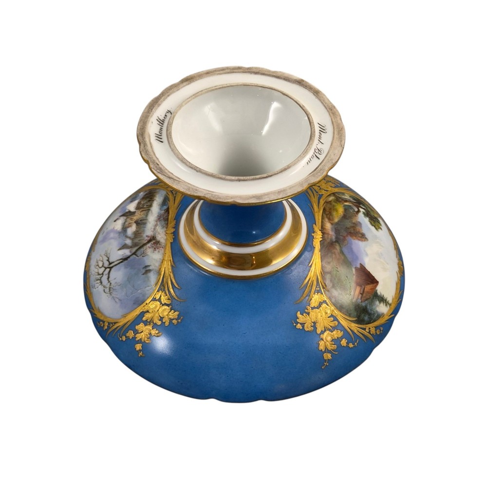 A cobalt blue and gilt porcelain tazza elevated on a pedestal base, adorned with a hand-painted winter landscape cartouche. View XV