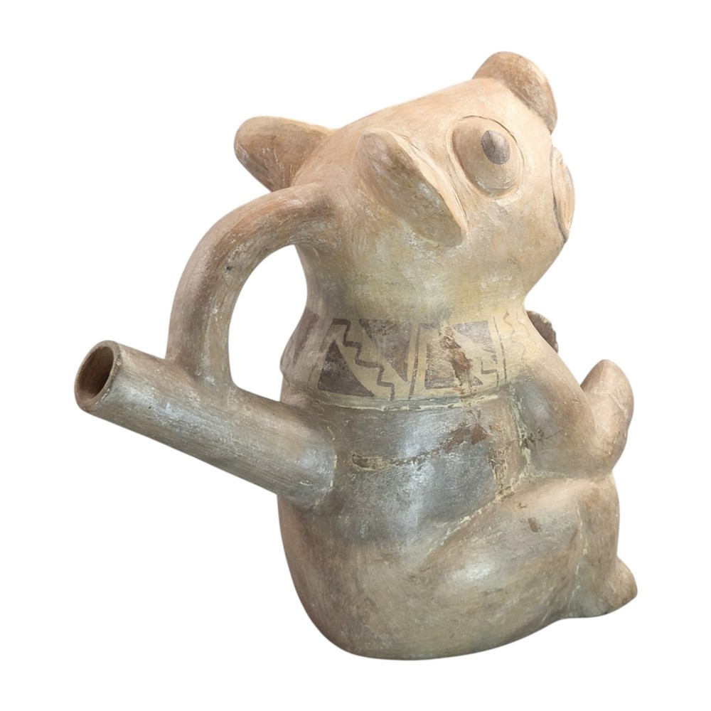 A pre-Columbian terracotta zoomorphic vessel featuring an animal form with painted geometric patterns around the neck and a integrated handle spout. View IV