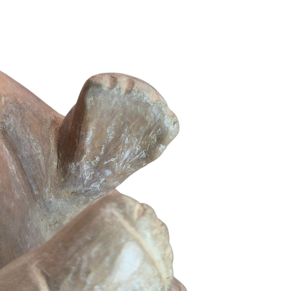 A pre-Columbian terracotta zoomorphic vessel featuring an animal form with painted geometric patterns around the neck and a integrated handle spout. View XII