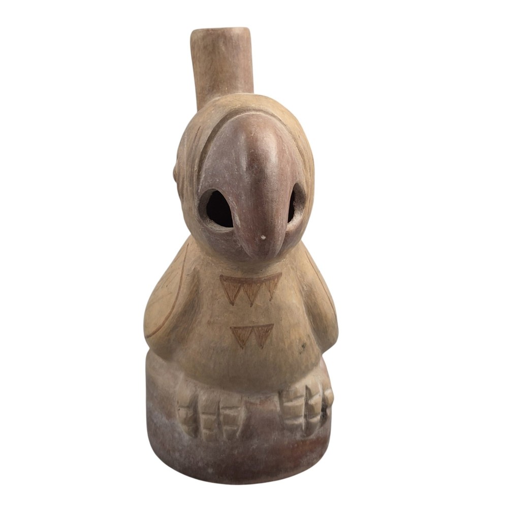 A beige terracotta Pre-Columbian stirrup spout vessel sculpted in the shape of a perched bird. View VI