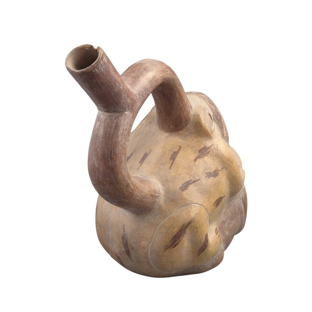 A terracotta stirrup spout vessel sculpted in the form of two stacked frogs with incised facial details and painted accent lines. View III