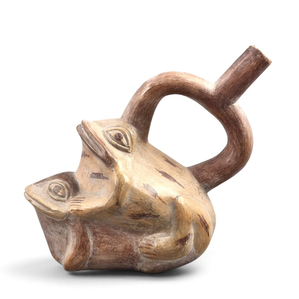 A terracotta stirrup spout vessel sculpted in the form of two stacked frogs with incised facial details and painted accent lines. View VIII