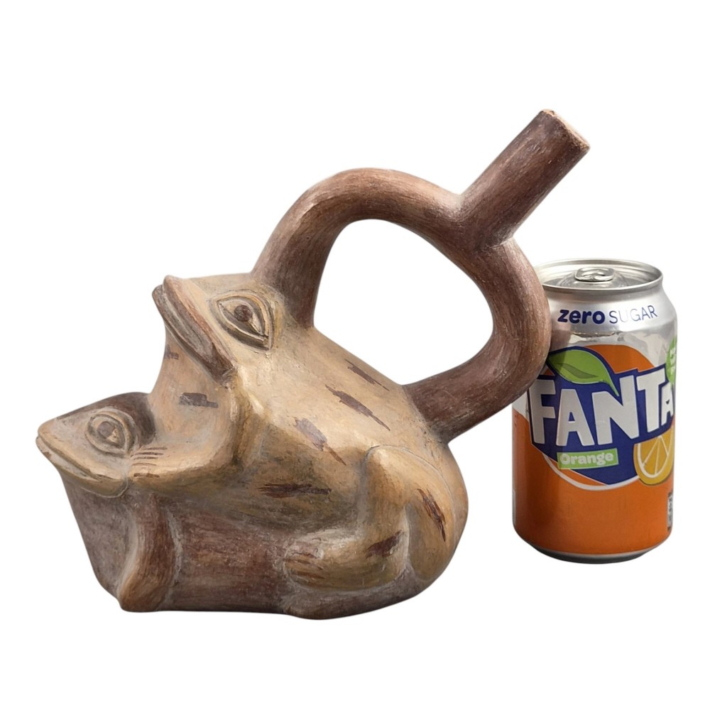 A terracotta stirrup spout vessel sculpted in the form of two stacked frogs with incised facial details and painted accent lines. View IX