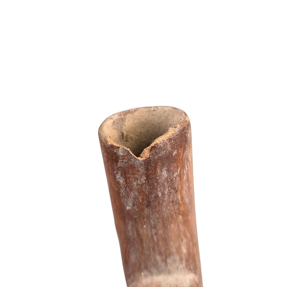 A terracotta stirrup spout vessel sculpted in the form of two stacked frogs with incised facial details and painted accent lines. View X