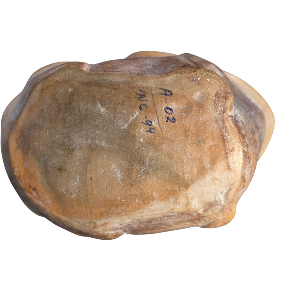 A terracotta stirrup spout vessel sculpted in the form of two stacked frogs with incised facial details and painted accent lines. View XII