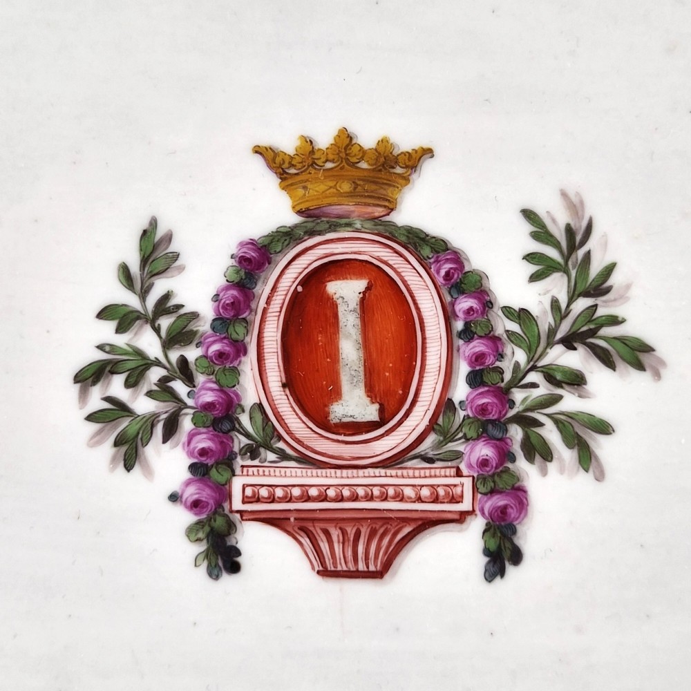 An eighteenth-century rectangular white porcelain serving tray featuring shaped corners, delicate gilded scrollwork borders, and a central hand-painted crowned monogram. View IV