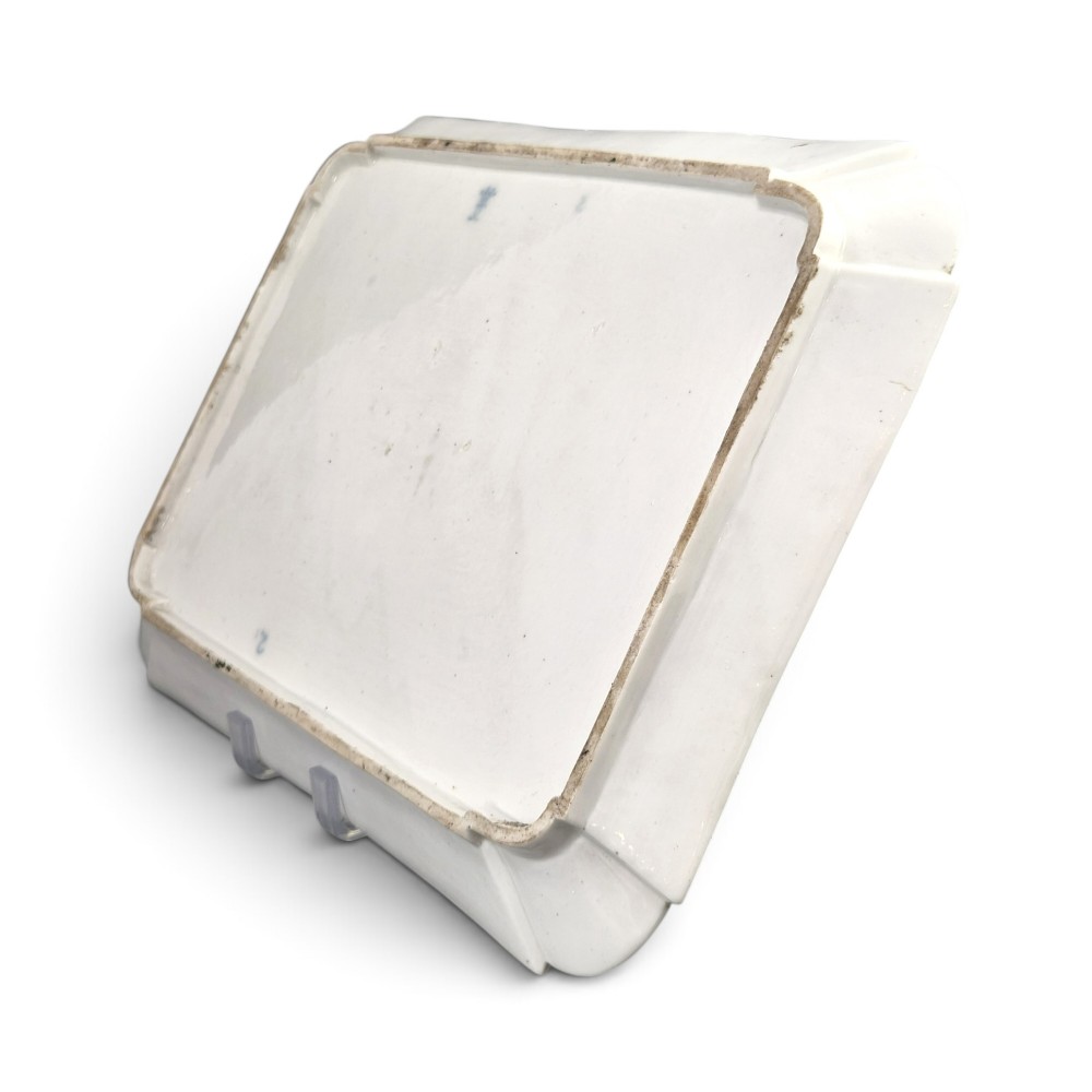 An eighteenth-century rectangular white porcelain serving tray featuring shaped corners, delicate gilded scrollwork borders, and a central hand-painted crowned monogram. View VIII