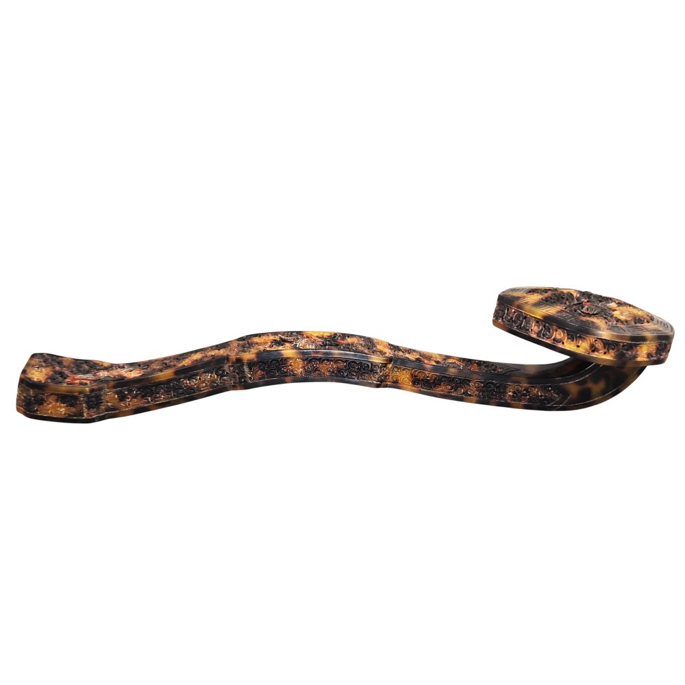 A late 19th-century Chinese Qing Dynasty ruyi sceptre carved from translucent mottled amber and dark brown tortoiseshell with intricate relief carving along the handle and head. View II