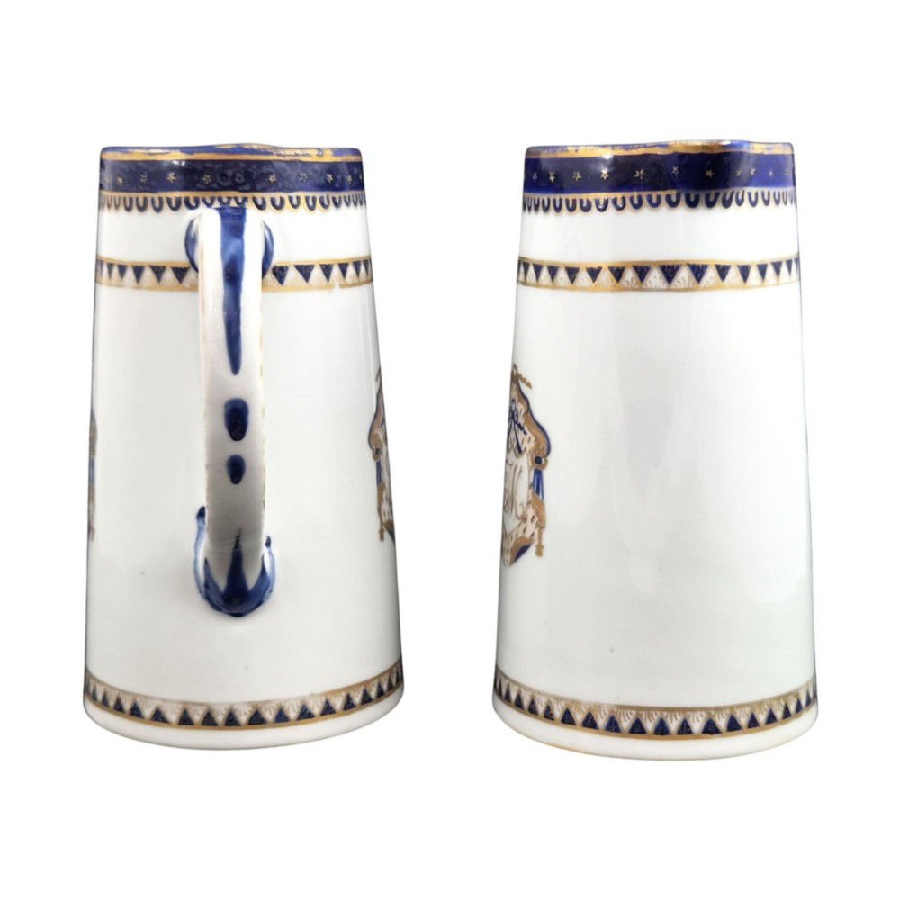 A five-piece late 18th-century Chinese export porcelain tea service featuring two cream jugs, two saucers, and a footed dish decorated with cobalt blue borders, gilt detailing, and central monograms. View XIII