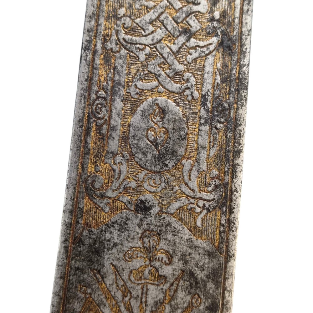 A 19th-century Pesh-Kabz knife featuring a recurved single-edged steel blade with surface etching, a brass bolster, and a tapered carved horn handle. View XI