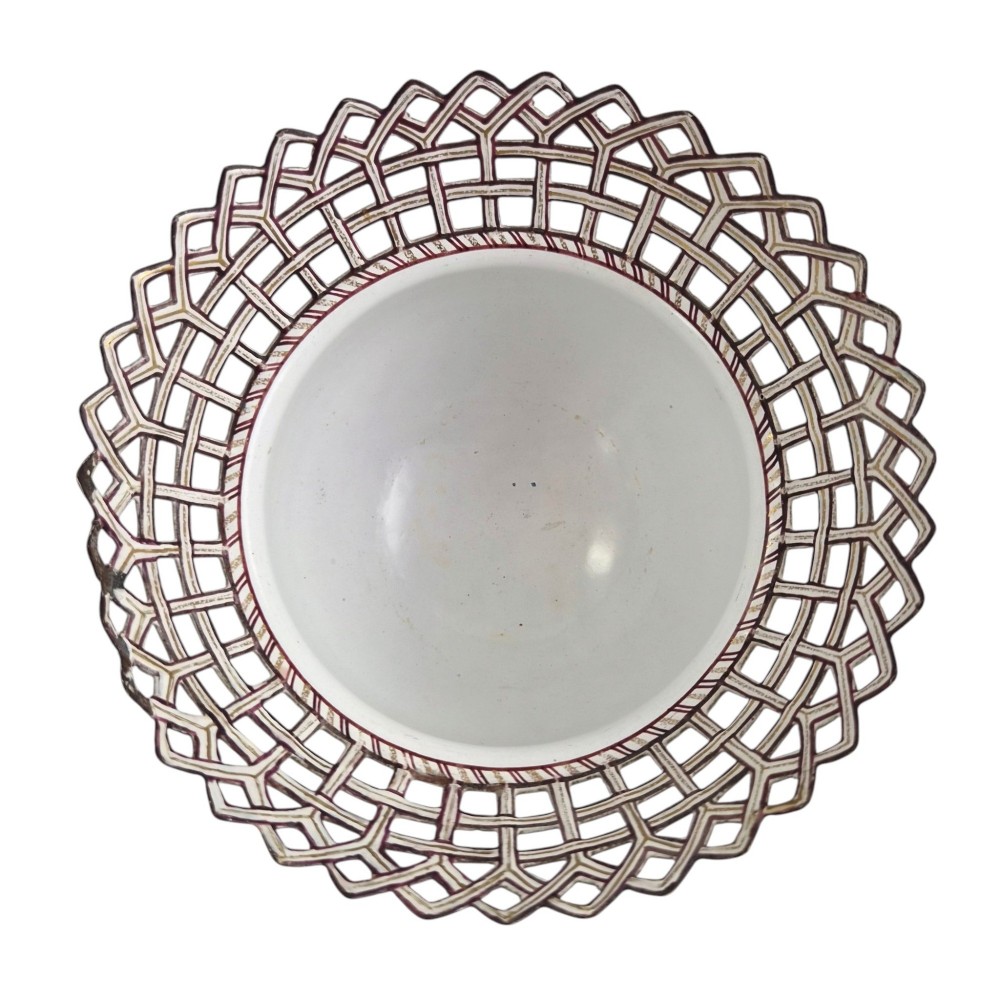 A pair of off-white 19th-century French tole peinte chestnut urns featuring hand-painted botanical motifs, pierced lattice galleries, and shell-form finials on the lids. View IX