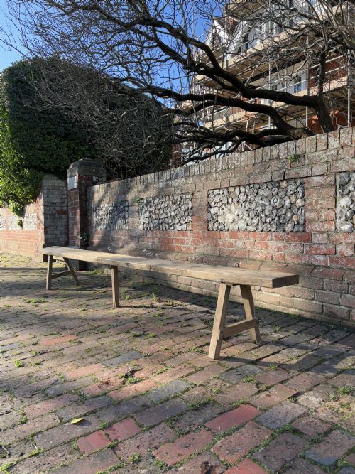 A PAIR OF FRENCH EARLY 20TH CENTURY PROVINCIAL OAK TRESTLE BENCHES 346CM - ADDITIONAL PHOTO 1