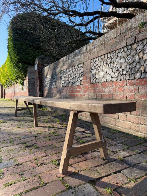 A PAIR OF FRENCH EARLY 20TH CENTURY PROVINCIAL OAK TRESTLE BENCHES 346CM - ADDITIONAL PHOTO 3