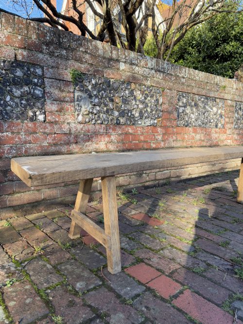 A PAIR OF FRENCH EARLY 20TH CENTURY PROVINCIAL OAK TRESTLE BENCHES 346CM - ADDITIONAL PHOTO 6