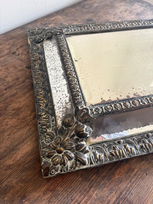 A 19TH CENTURY DUTCH REPOUSSE BRASS CUSHION MIRROR 39CM WITH FOXED MERCURY PLATE - ADDITIONAL PHOTO 1