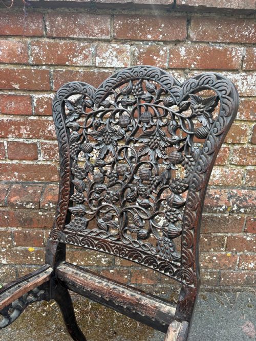 AN EXPERTLY REFURBISHED ANGLO INDIAN 19THC BURMESE CHAIR WITH ROSEWOOD HAND CARVED FLORAL DETAILING - ADDITIONAL PHOTO 1