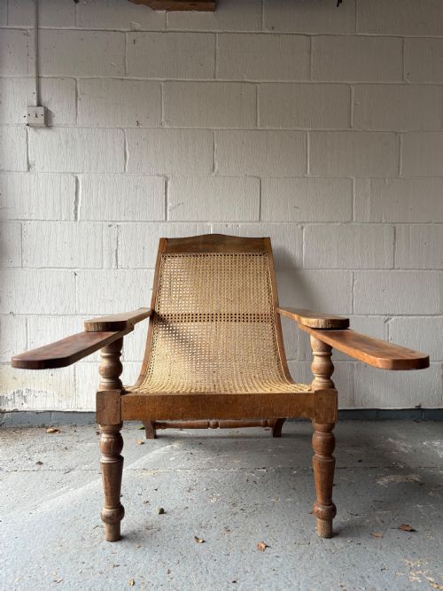A PAIR OF ORIGINAL ANGLO INDIAN TEAK AND CANE PLANTATION CHAIRS CIRCA 19101920 - ADDITIONAL PHOTO 2