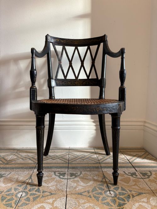 ebonised and gilt painted regency open arm elbow chair cane seat c1820 manner john gee - CATEGORY: ANTIQUE CHAIRS - DATED REGENCY