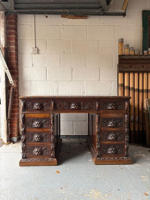 A 19TH CENTURY CARVED OAK FLEMISH STYLE GREEN MAN PARTNERS DESK 122CM C1880 - ADDITIONAL PHOTO 2