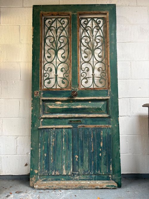 a 19thc french oak front door 200cm with matching overdoor ironwork panels - CATEGORY: ANTIQUE MISCELLANEOUS - DATED 19TH CENTURY