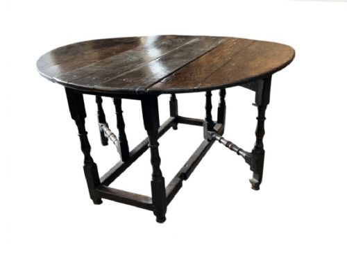 A LATE 17 TO 18TH CENTURY OAK PLANK TOP GATELEG TABLE WITH TURNED BALUSTER LEGS - ADDITIONAL PHOTO 1