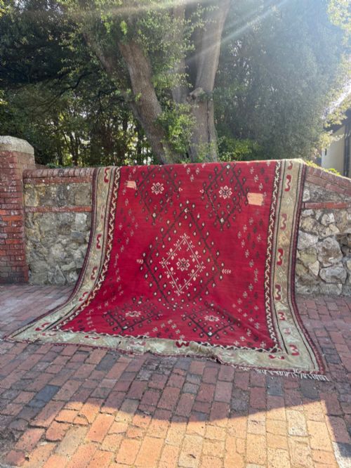 A LARGE ANATOLIAN FLATWEAVE KILIM RUG C1920S 340CM X 270CM TIMEWORN REPAIRS - ADDITIONAL PHOTO 1