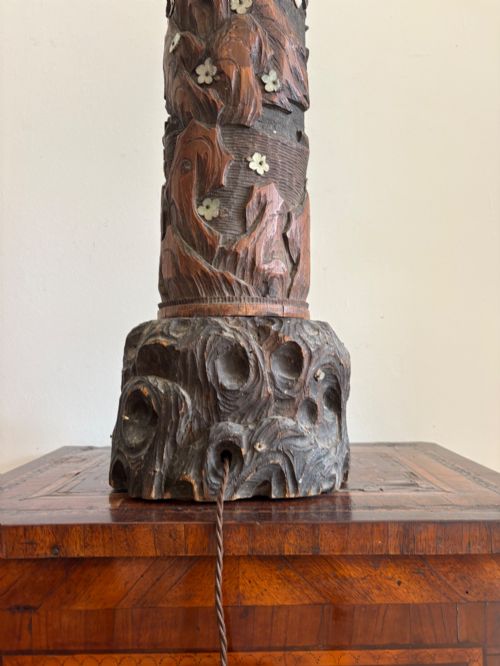 fig 3. A tall Japanese Meiji period carved wooden brush pot converted into a table lamp with mother-of-pearl details and a patterned pleated lampshade.