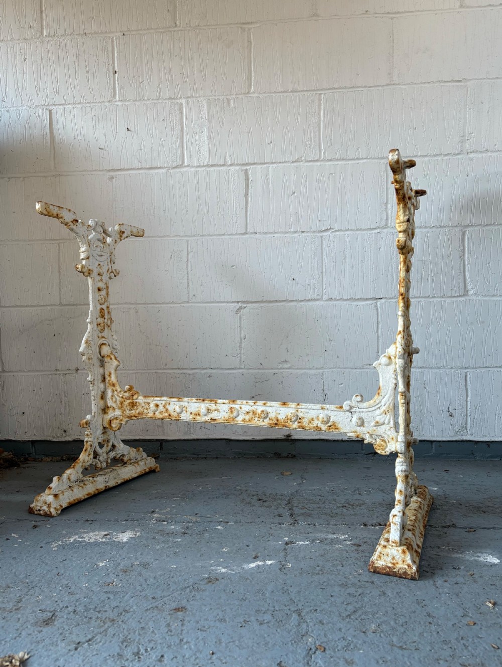 A White Painted Victorian Cast Iron Garden Table Base, 90cm wide