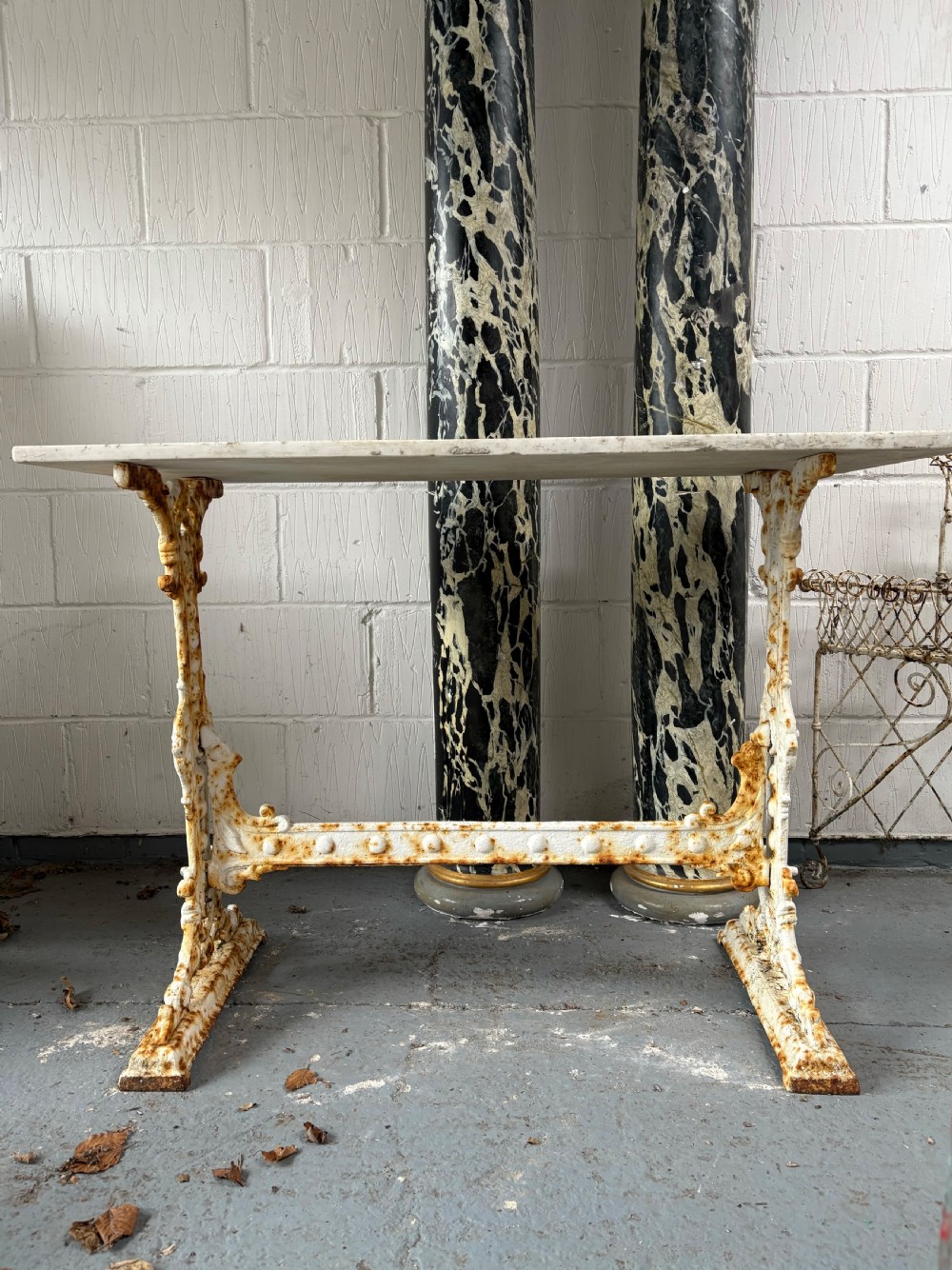 A White Painted Victorian Cast Iron Garden Table Base with 110cm Marble Top. View II