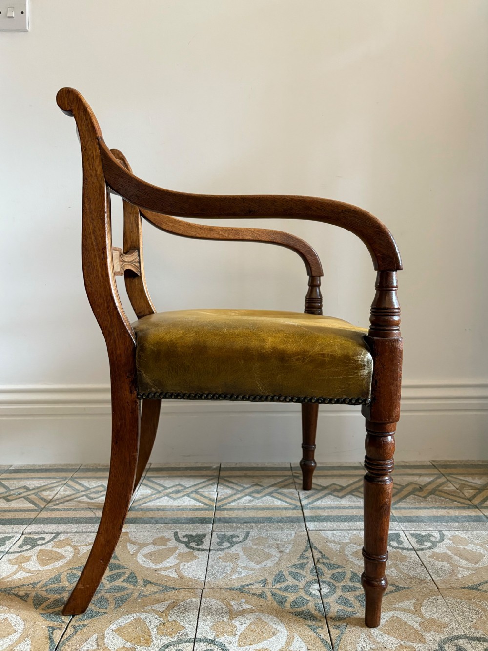 A Regency Mahogany Armchair with Leather Seat and Scrolling Arms, C1820