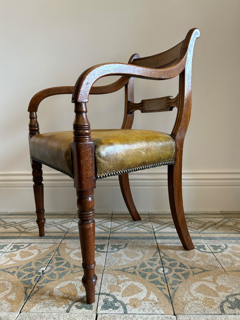 A Regency Mahogany Armchair with Leather Seat and Scrolling Arms, C1820 View III