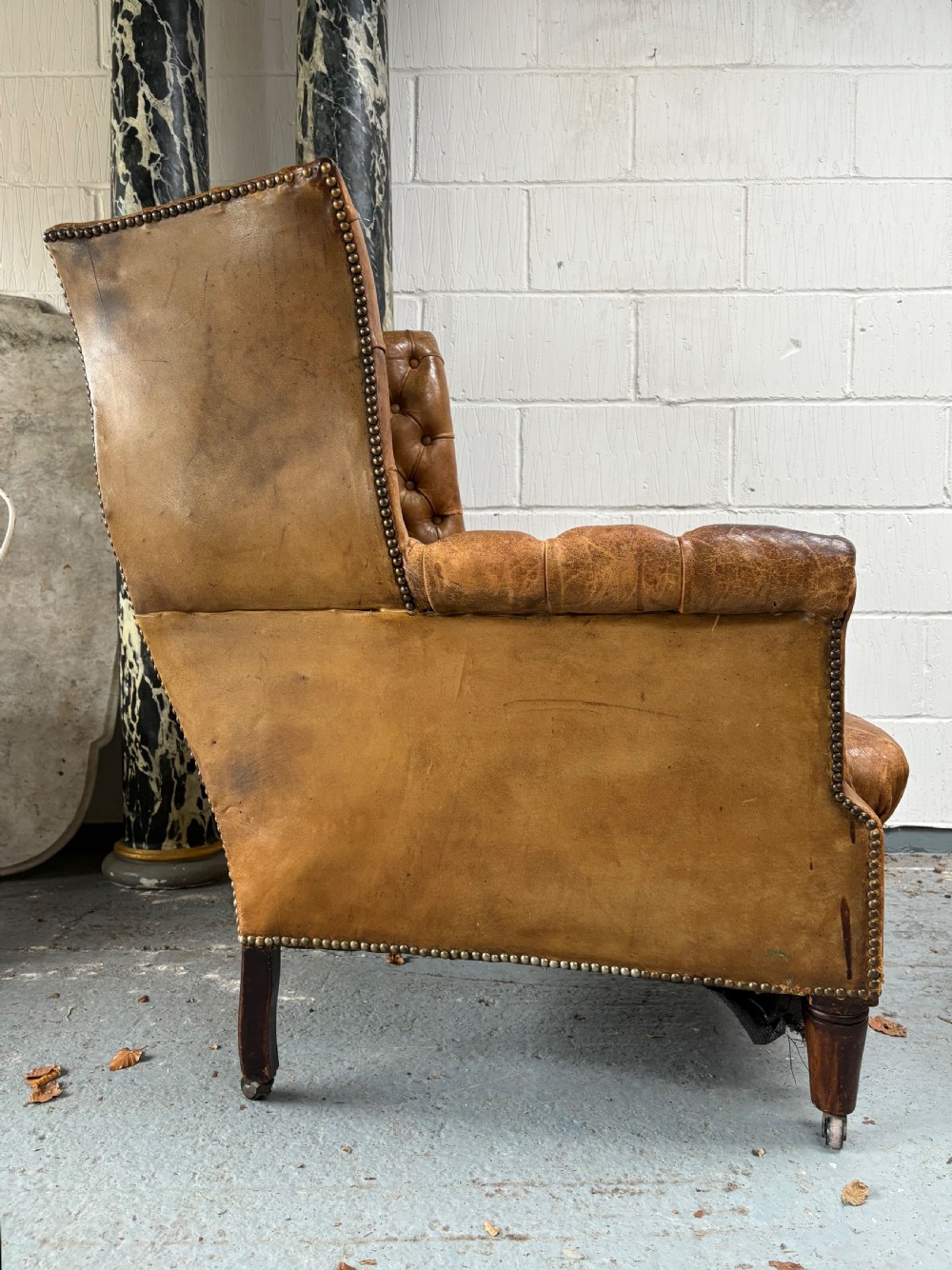 An Edwardian Button and Studded Leather  Antique Wing Back Arm Chair C1910