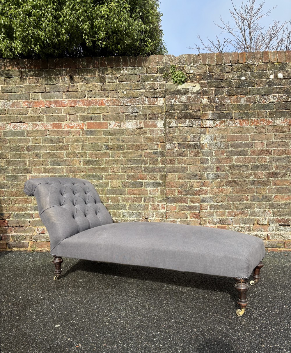 A 19th Century Button Back Day Bed, Mahogany Turned Legs and Castors, 170cm