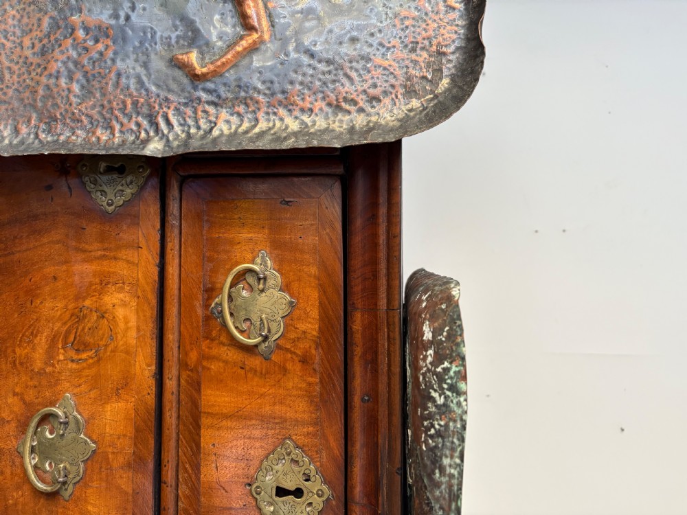 A pair of square late 19th-century hammered metal trays with raised repousse animal figures of an ibex and a feline. View VII