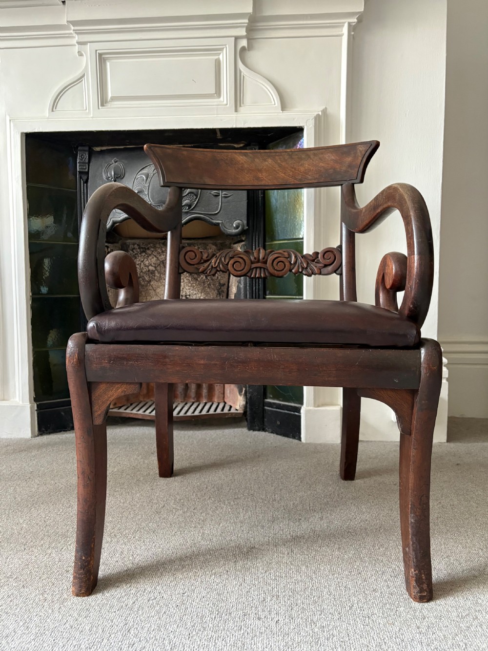 A Regency Scroll Arm Mahogany Chair with Leather Seat and Sabre Legs, C1820 View II