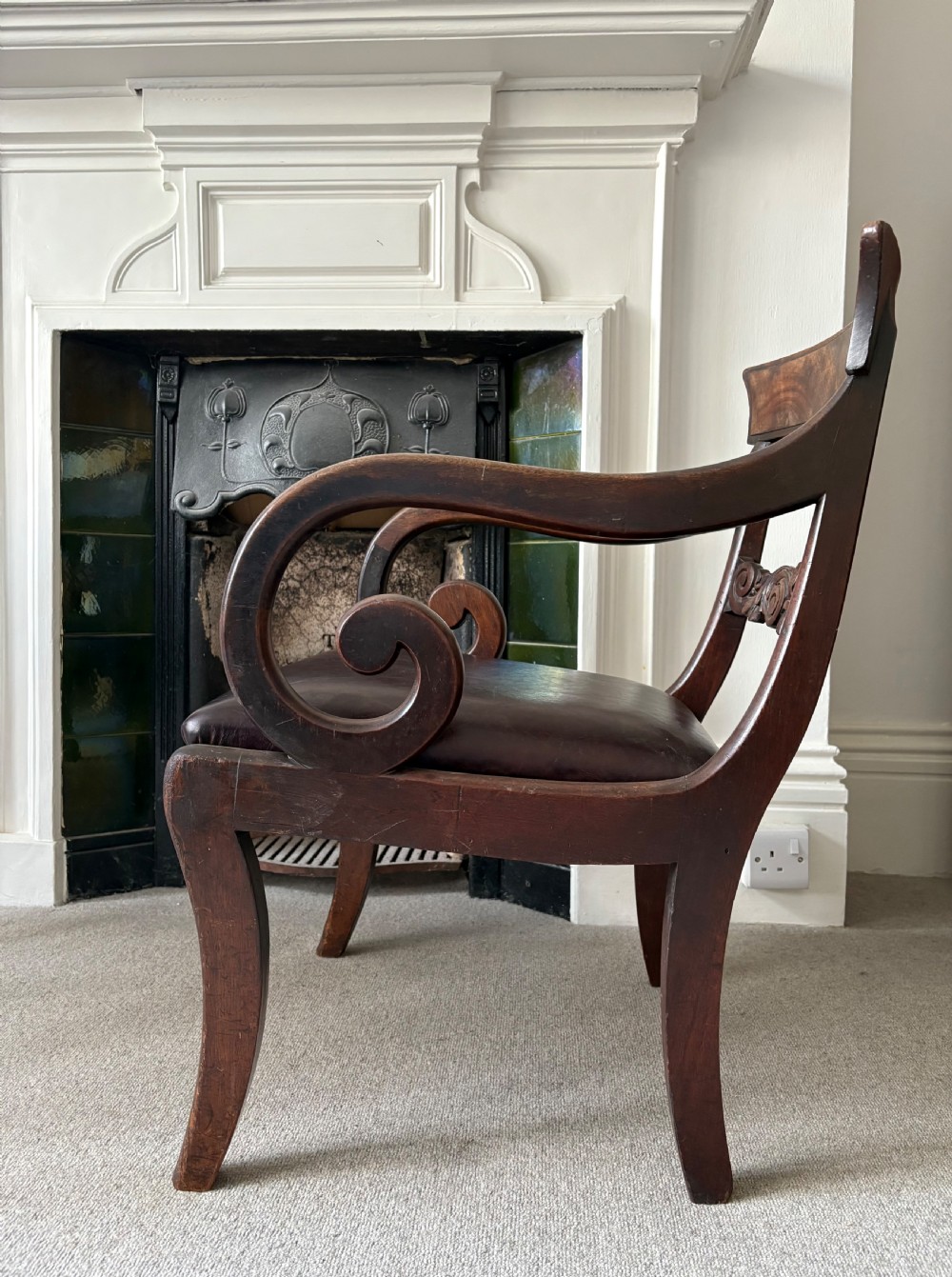 A Regency Scroll Arm Mahogany Chair with Leather Seat and Sabre Legs, C1820 View IV