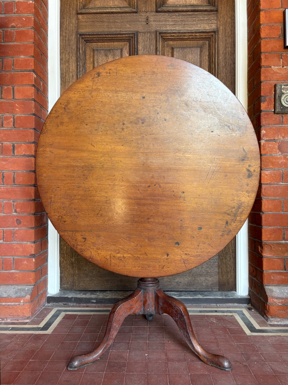 A Georgian Single Plank Circular Mahogany Tilt Top Table, C1780, 85cm diameter