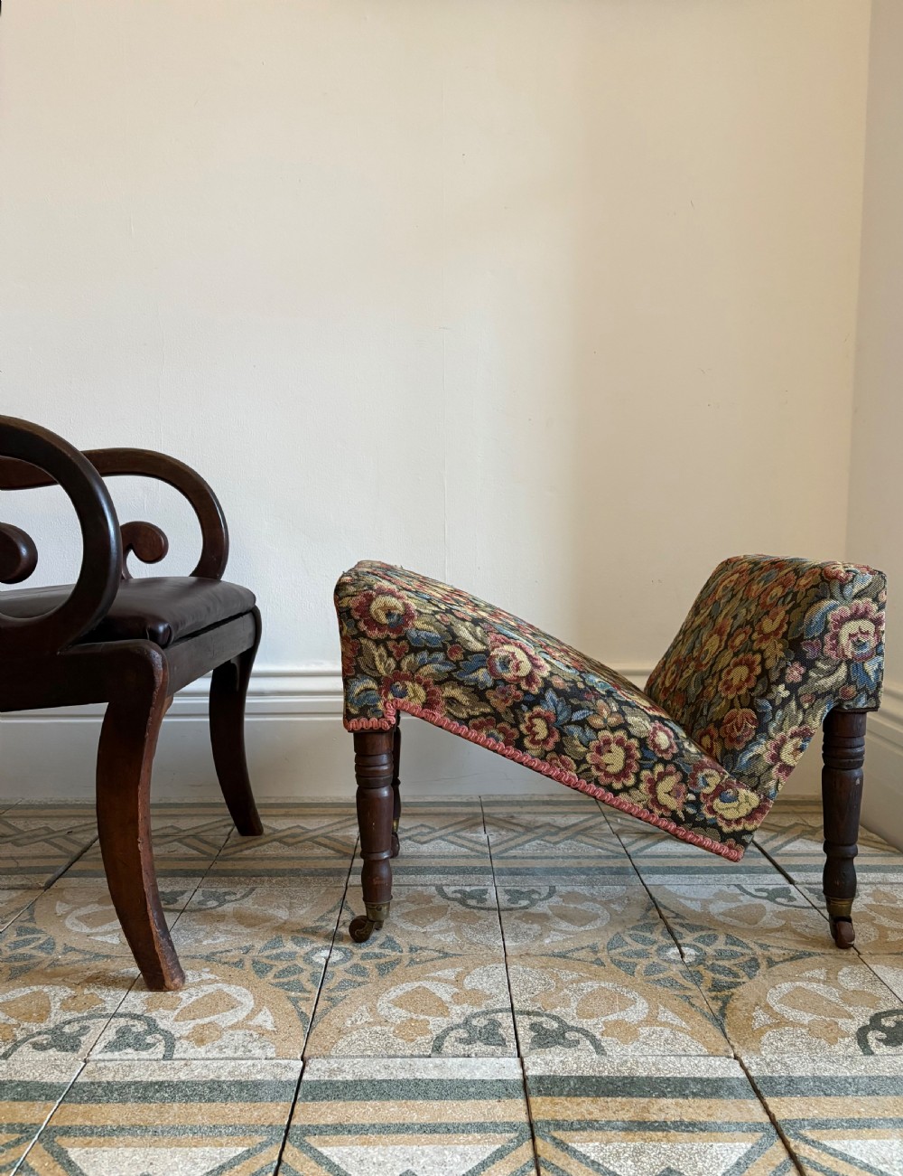 A 19th Century English Mahogany Frame Gout Stool on Castors C1880