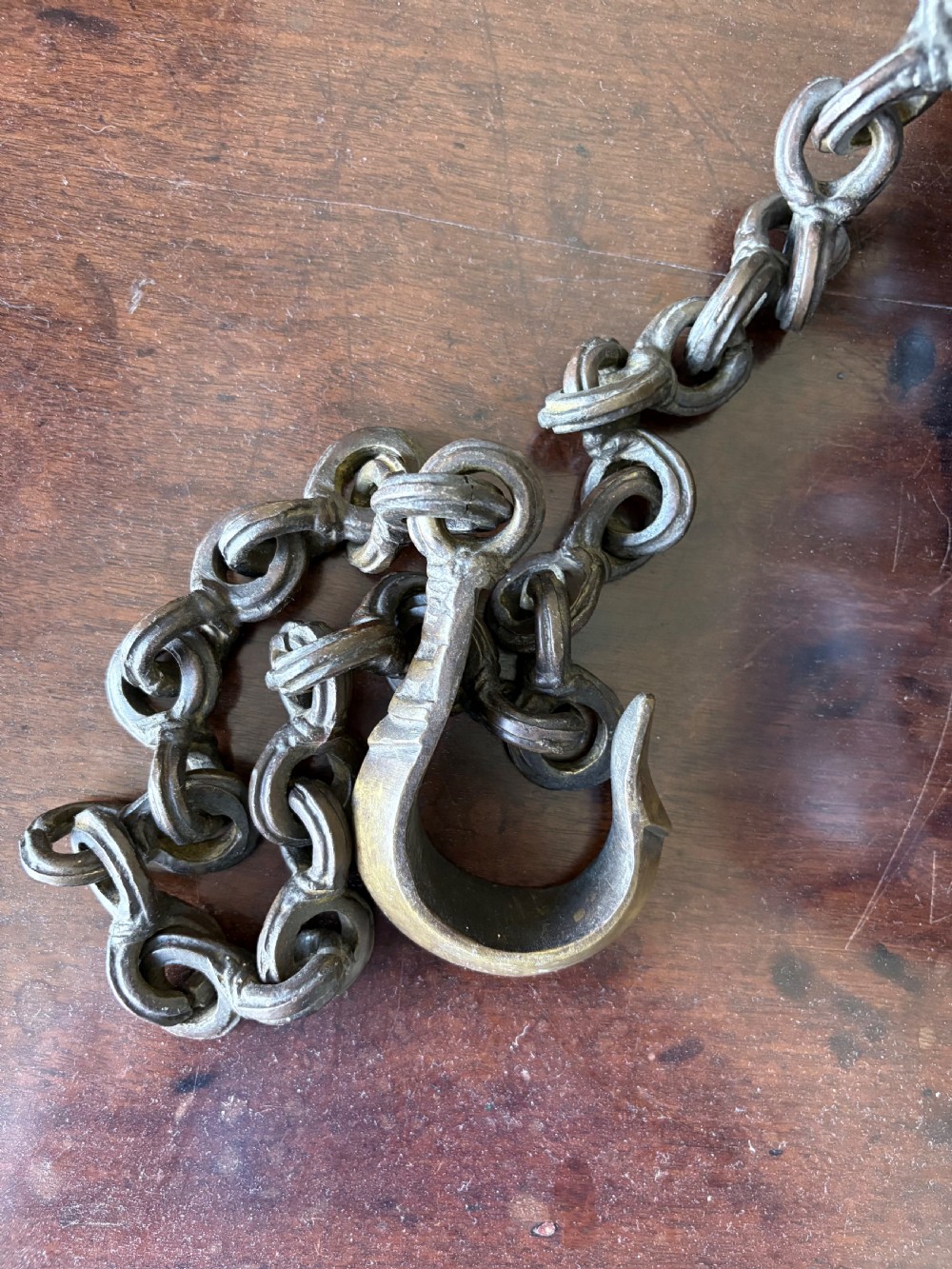 A Heavily Cast Bronze 19th Century Hindu Temple Bell and Chain, 108cm drop View IX