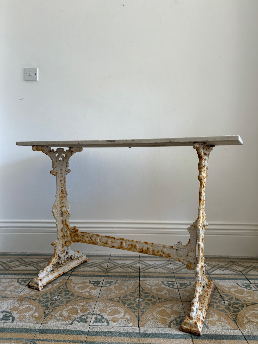 A White Painted Victorian Cast Iron Condervatory Garden Table with 108cm Marble Top.