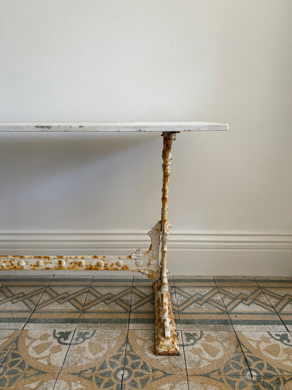 A White Painted Victorian Cast Iron Condervatory Garden Table with 108cm Marble Top. View II