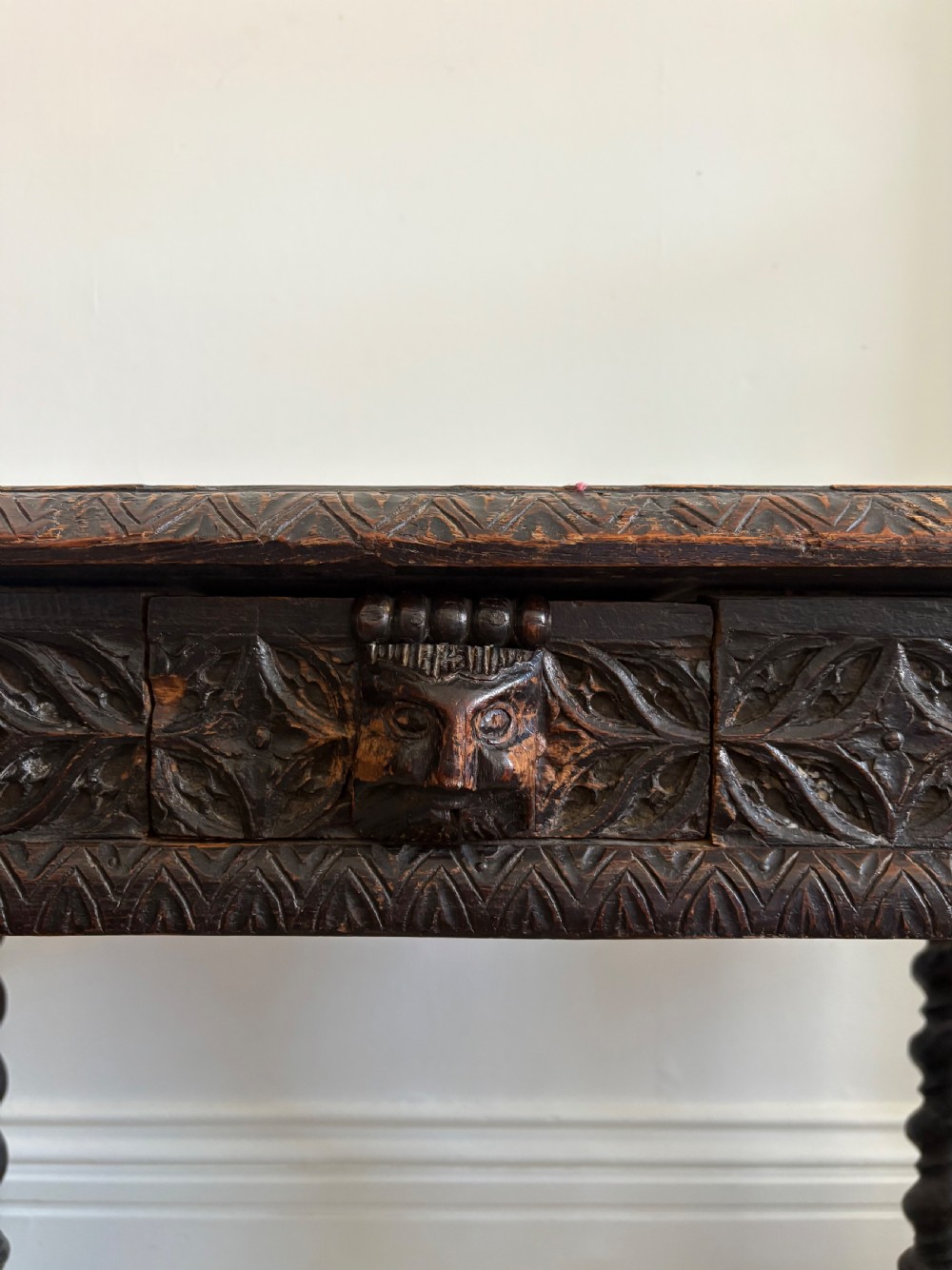 A 17th century Flemish carved oak side table with barley twist , grotesque masks and up finial, 97cm View III
