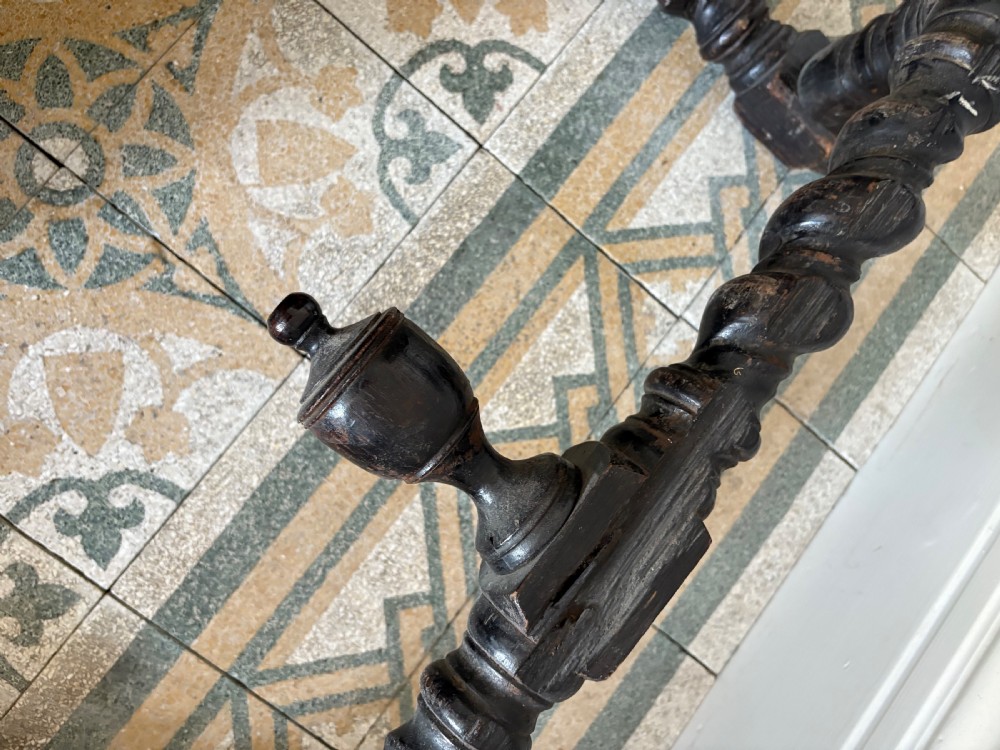 A 17th century Flemish carved oak side table with barley twist , grotesque masks and up finial, 97cm View X
