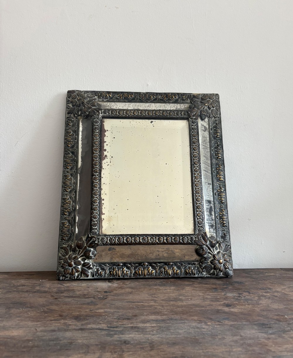 A 19th Century Dutch Repousse Brass Cushion Mirror 39cm with Foxed Mercury Plate View VI