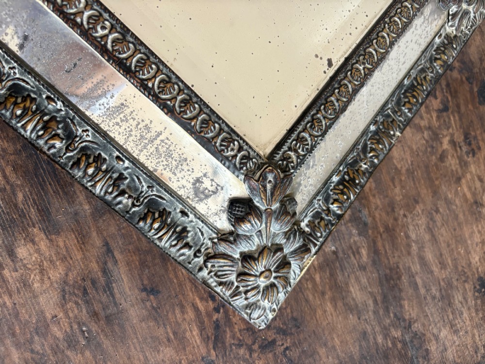 A 19th Century Dutch Repousse Brass Cushion Mirror 39cm with Foxed Mercury Plate View IX