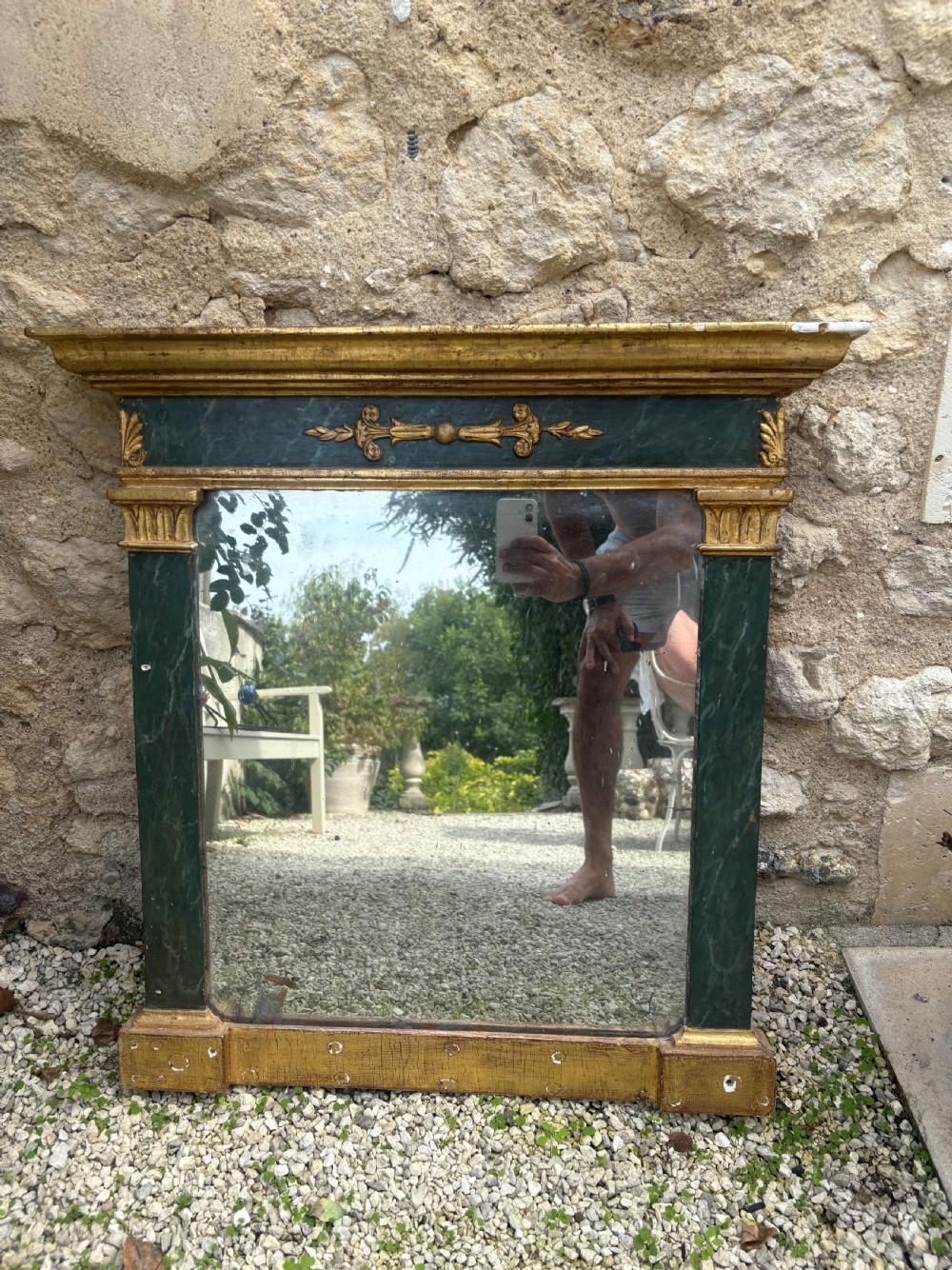 An early 19th-century Neoclassical rectangular wall mirror featuring a giltwood cornice and base flanking green faux-marble painted pilasters and frieze. View XIII